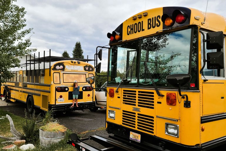 School bus conversion; six-month progress